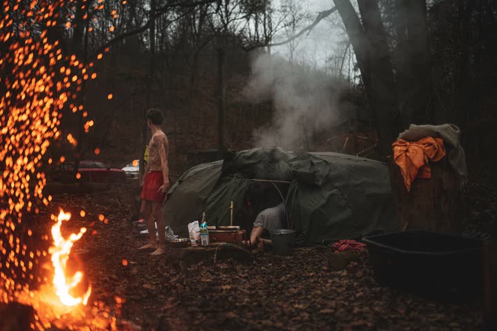 A fire with sparks by the sweat lodge