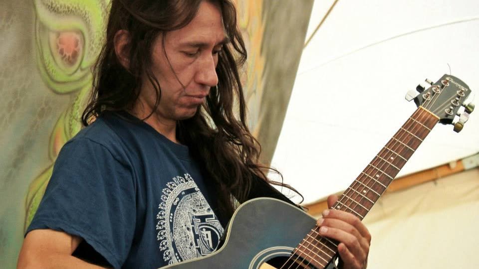 A musician with a guitar